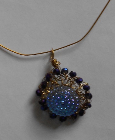 Glass button and beads with brass crochetted wire